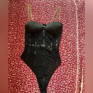 Black body suit with golden chains